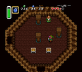Link inside of Aginah's Cave in the Desert of Mystery.