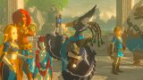 Revali holding the Sheikah Slate from Breath of the Wild