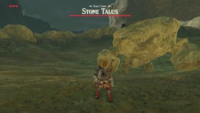 Link fighting a Stone Talus.
