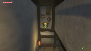Link will appear at a secret opening near the main entrance of Lenzo's house