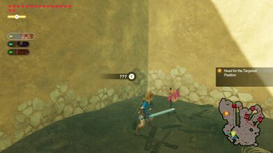 There is a pinwheel at the northernmost portion of Gerudo Town, near some rubble.