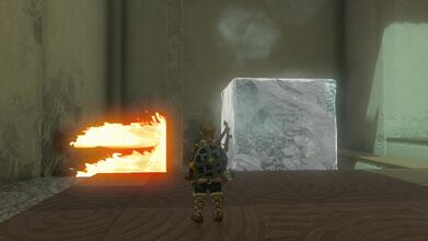 Use the stone platform to block the fire