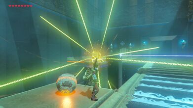 Use Stasis on the laser that is on Link's side of the conveyer belt.