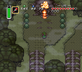 ‎Link opening the main part of the Skull Woods dungeon.