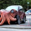 octopus_eating_a_car_by_criticaldove_dfi8g8k-fullview.jpg