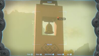 The Unity Bell is above the Goddess Statue at the center of Tarrey Town