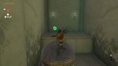 Grab the ball with Ultrahand and place it half way towards the treasure chest. Jump over to the chest to get a Large Zonai Charge.