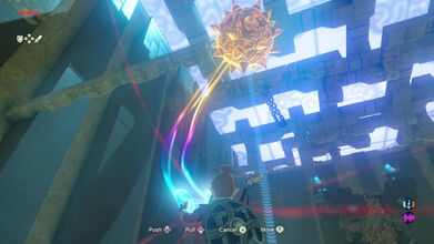 Link can hook the balls around the beams at the top.