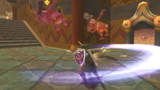 Link, carrying a Goddess Shield, swipes at a couple of Bokoblins.