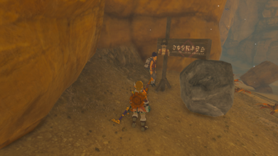 Location - Gerudo Canyon Stable Found just southeast of the stable. Link can use a Boulder to hold up the sign.