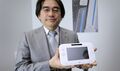 Satoru Iwata showing off the Wii U