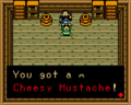 Link collecting the Cheesy Mustache inside the Middle House