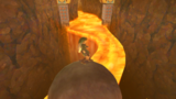 Link running on a giant ball in the Fire Sanctuary.