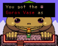 Link receiving the Goron Vase in Oracle of Seasons