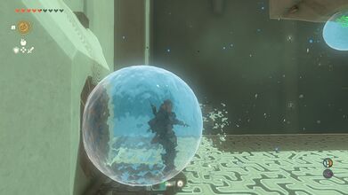 Stand inside the nearby water orb