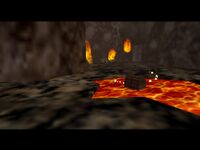 5. You'll find a large switch in the lava. Wear the Goron Mask and step on it to cause a chest to appear in another lava puddle. Snag it, then head back up the stairs.