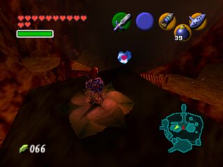 #27: As a child, play Bolero of Fire to warp to Death Mountain Crater and plant a Magic Bean in the soft soil next to the Triforce Pedestal. Warp back as an adult and ride the Magic Bean up to one of the two smoky mountains in the center of the area, which has a Piece of Heart atop it.